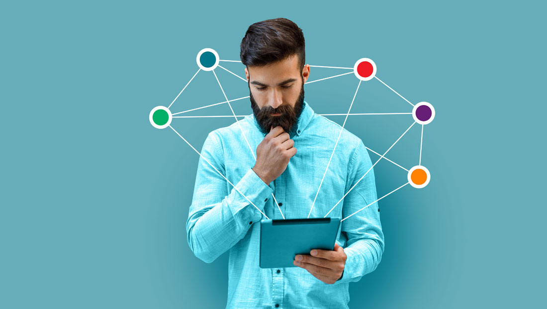 Man looking at a tablet