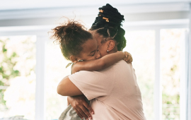 Mother daughter embracing