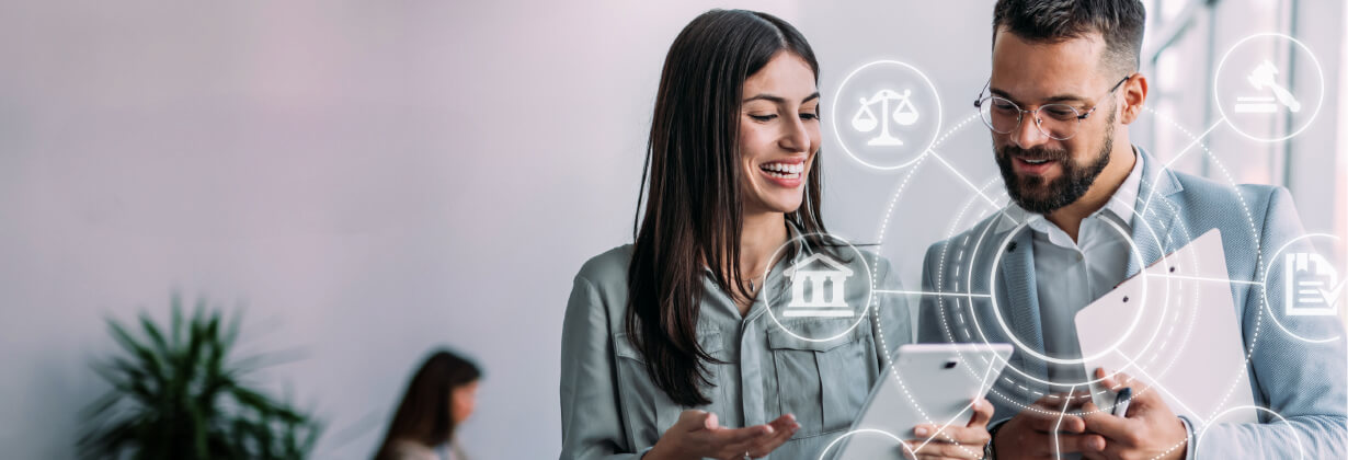 Man and Women looking at tablet