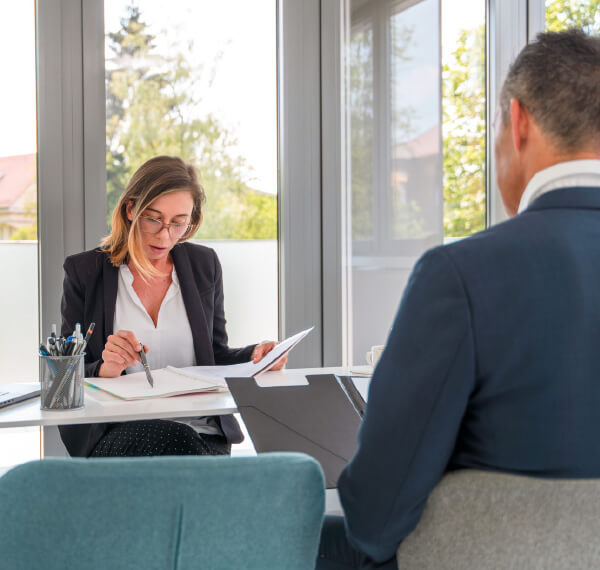 Women and man in meeting