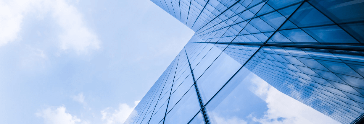 Building with a blue sky and white clouds