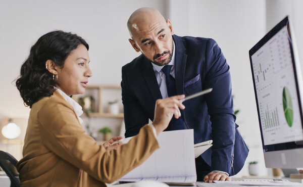 coworkers on computer