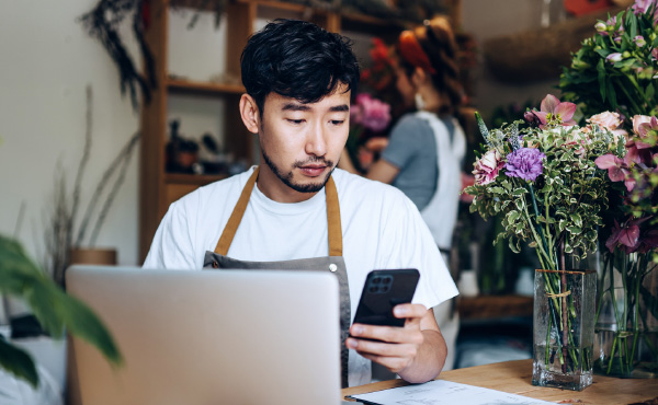 Flower shop man on phone