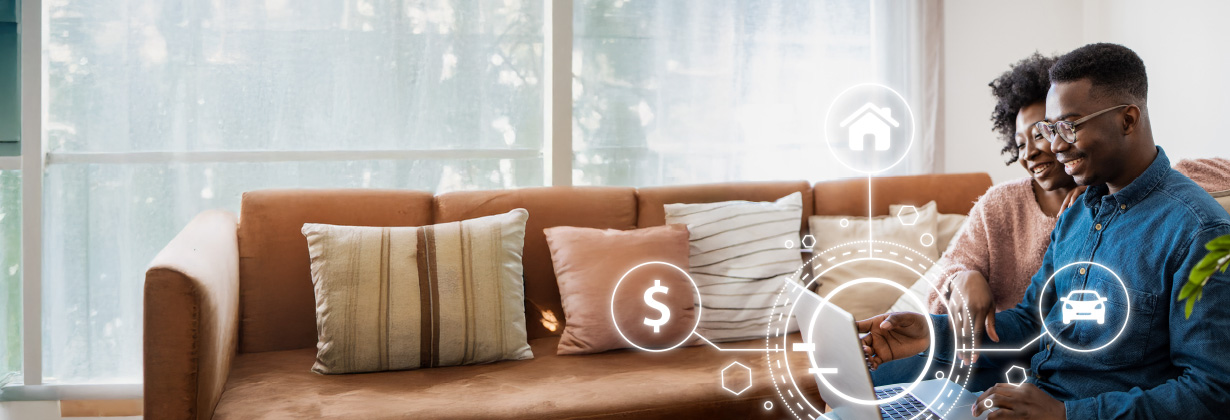 Couple on laptop smiling