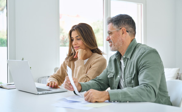 two people in a room collaborating