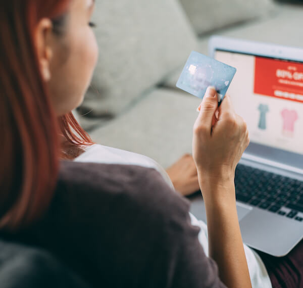 Phone over keyboard on true cost of fraud