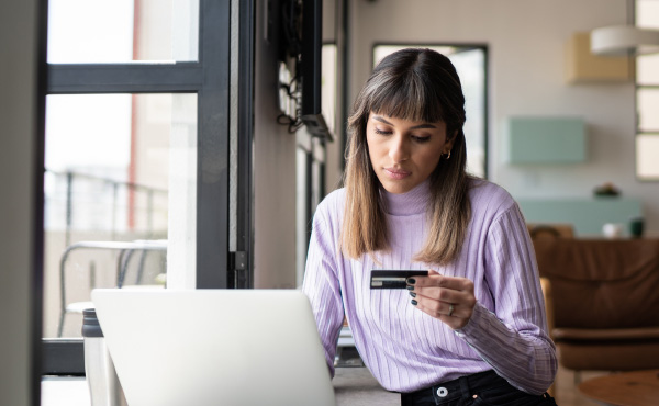 Woman holding credit card