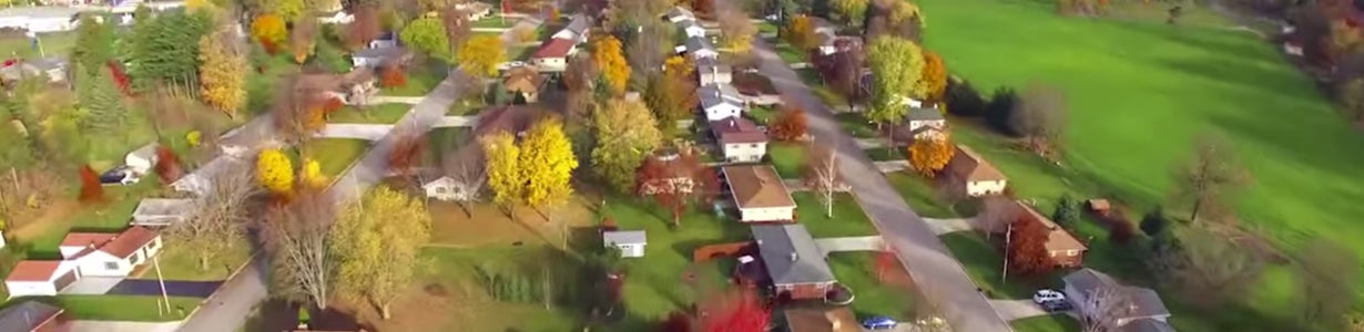 Home inspection index video with aerial view of houses