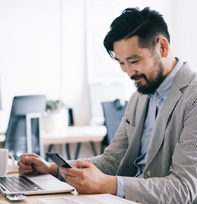 Young man completing life insurance application