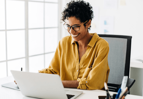 Women at desk and computer at work