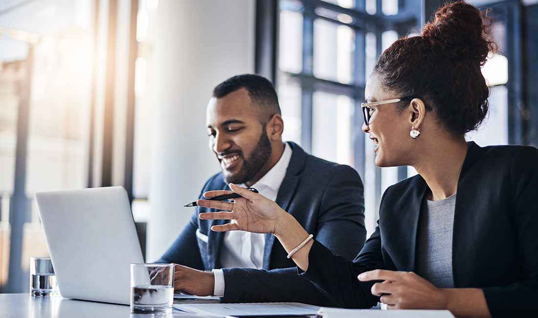 Team working on laptops