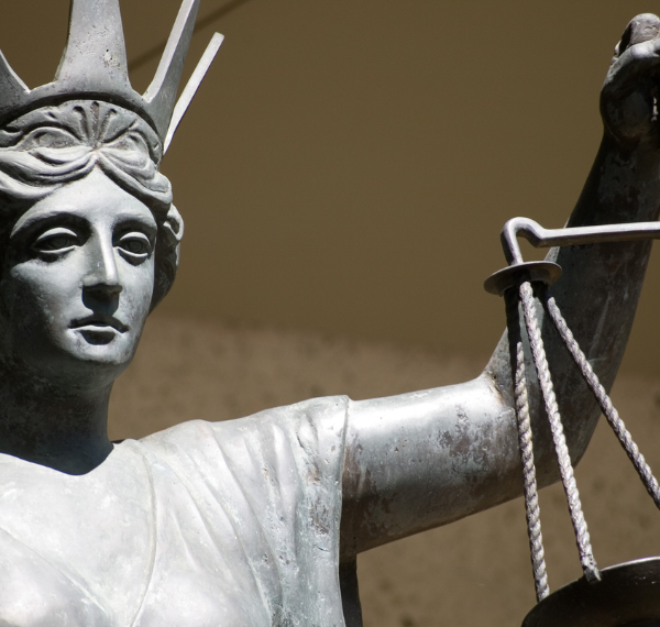 Scales of justice comparing age verification