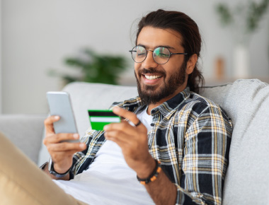 guy reviewing his credit card